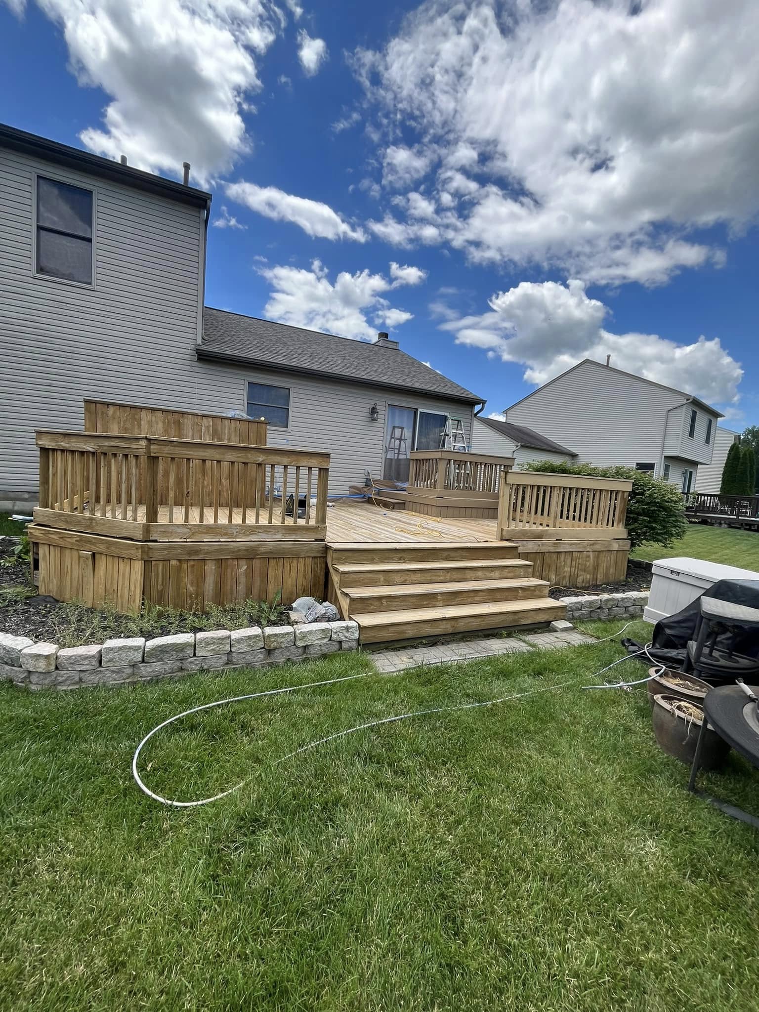 Bare unfinished deck before staining